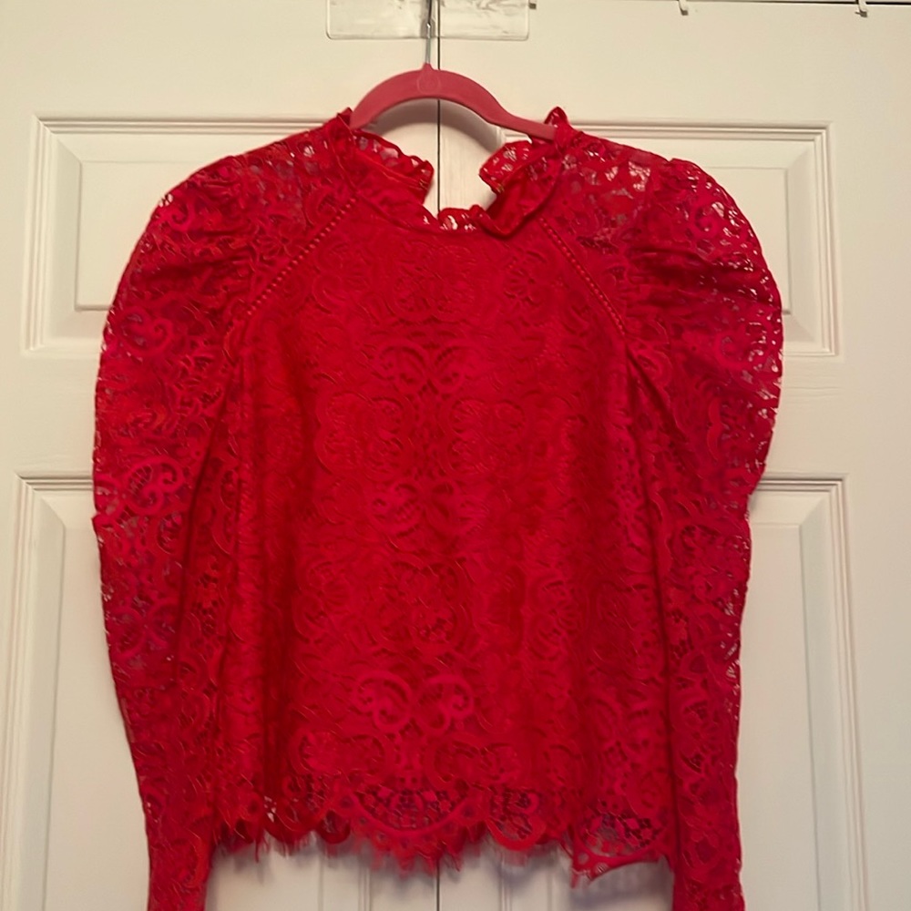 Lilly Pulitzer red lace blouse. Sheer sleeve. Good condition.